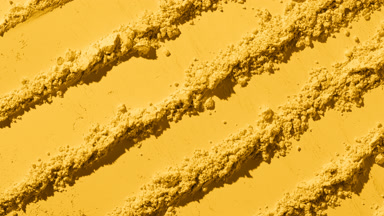 Yellow Powder Surface with Linear Knife Trails
