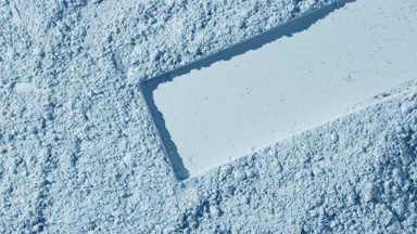 Pale Blue Powder Surface with Clear Rectangular Mark