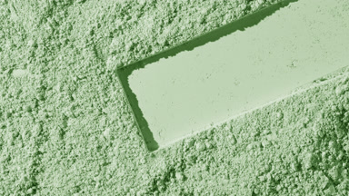 Distinct Rectangular Mark on Pale Green Powder Surface