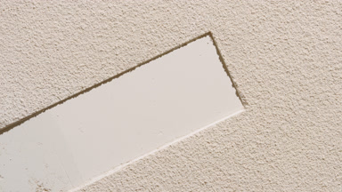 Beige Powder Surface with Evolving Rectangular Imprint