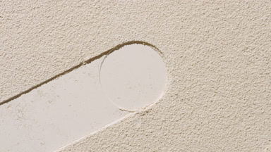 Dynamic Beige Powder Surface with Circle Imprint