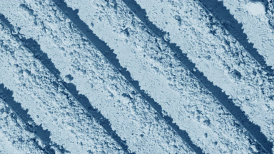Pale Blue Powder Surface with Parallel Knife Trails