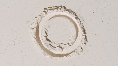 Beige Flattened Powder with Circle Imprint and Light