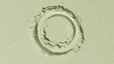 Pale Green Powder Surface with Circular Imprint and Light