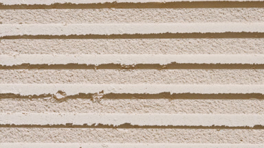 Beige Sifted Powder with Parallel Striped Imprints and Shadows