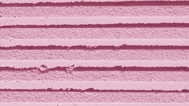 Shifting Shadows on Light Pink Sifted Powder Surface