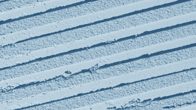 Fluid Shadows on Pale Blue Sifted Powder Layer