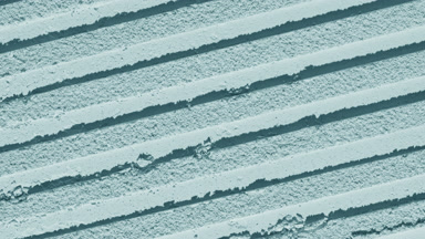 Ever-Changing Shadows on Pale Cyan Powder Surface