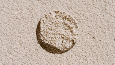 Beige Powder Texture Under Rotating Light in Campaign