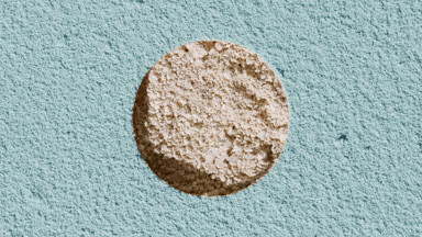 Cyan Coated Surface Revealing Beige Powder Texture