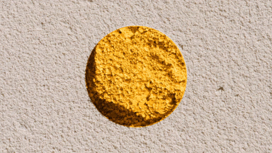 Yellow Powder Texture Through Beige Sifted Surface