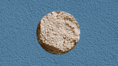 Beige Powder Texture Through Blue Sifted Surface