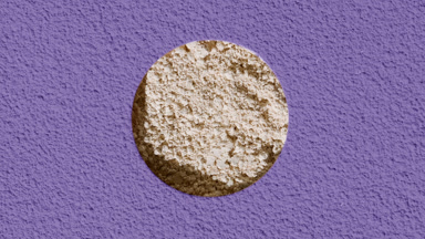 Beige Natural Powder Texture Beneath Violet Surface