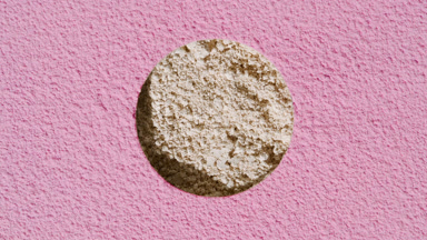 Beige Hole Revealing Pink Powder Texture with Dynamic Lighting