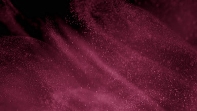 Pink Dust Cloud Against Dark Backdrop