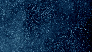 Scattered Blue Dust Particles in Air