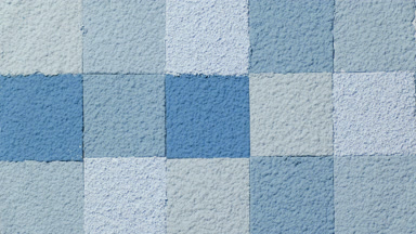 Blue Powder Mosaic Rippling from a Slow-Motion Water Drop