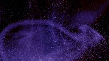 Violet Dust Motion Creating Atmosphere on Dark Background