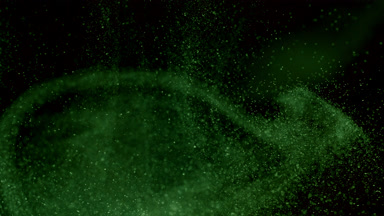 Floating Green Dust Particles on a Dark Background