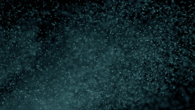 Scattered Cyan Dust Particles in Air