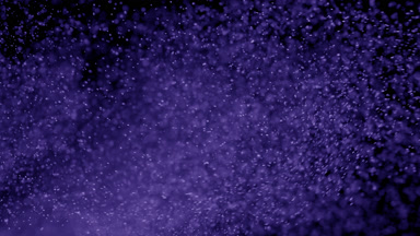 Soft Violet Dust Motion on Dark Backdrop