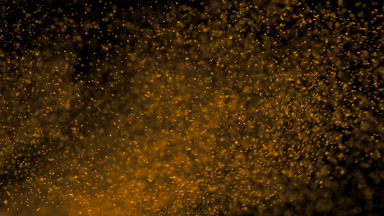 Floating Yellow Powder Dust on Black Background