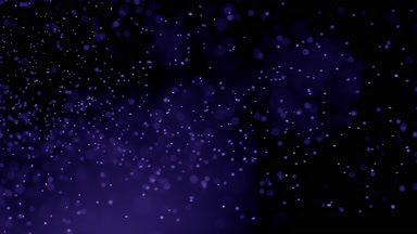 Scattered Violet Dust Particles in Air on Black