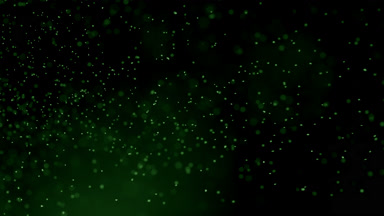 Suspended Green Dust Creating Atmosphere on Dark Background