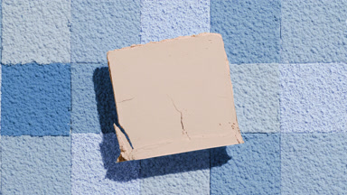 Beige Powder Square Against Blue Mosaic Background