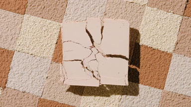 Cracked Beige Powder with Skin Tone Mosaic Background
