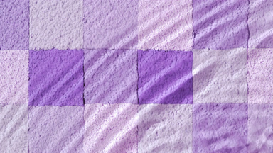 Slow-Motion Water Flow on Violet Shades Mosaic Surface