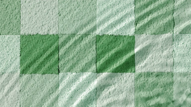 Slow-Motion Water Flow on Green Shades Mosaic Surface
