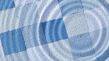 Concentric Ripples from Drop on Blue Shades Mosaic