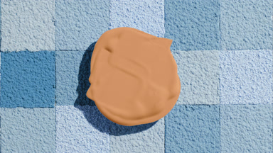 Beige Foundation Blob Over Blue Mosaic Background