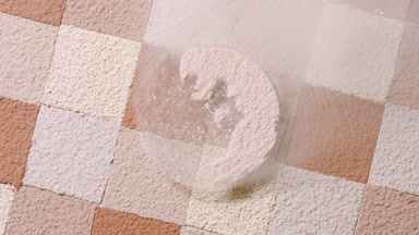 Slow-Motion Beige Powder on Mosaic Background
