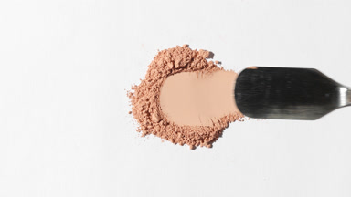 Beige Powder Smearing on Light Grey for Matte Promotion