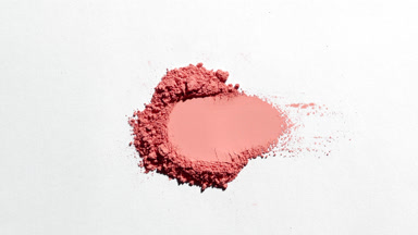 Dynamic Red Powder Heap for Blush Marketing