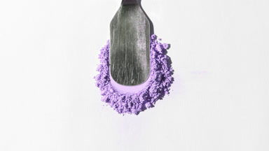 Violet Powder Heap on Soft Gray Background