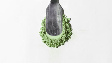 Pale Green Powder Heap on Light Grey Backdrop