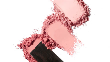 Red Powder Heaps Spread for Blush on Light Grey Background