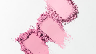 Macro Close-Up of Linear Pink Powder Smears on Grey Surface