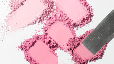 Top-Down View of Chaotic Pink Powder Smears for Blush Promotion