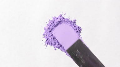 Violet Powder Heap on Light Grey Background