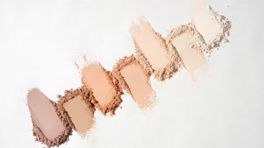 Top View of Seven Beige to Brown Powder Smudges with Shadows