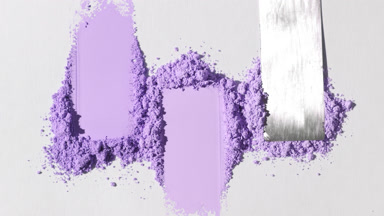 Violet Powder Heaps Smeared with Knife on Light Gray Canvas