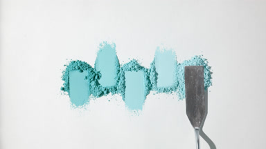 Cyan Powder Heaps Arrangement on Light Gray Background
