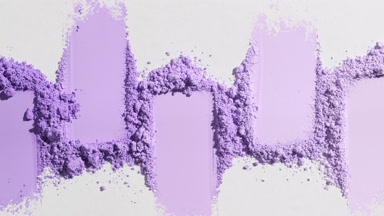 Violet Powder Smears on Light Grey Backdrop