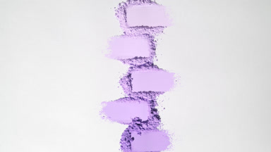 Violet Powder Streaks on Light Gray Background with Shadows