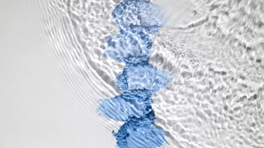 Slow-Motion Water Flow Over Blue Powder Heaps