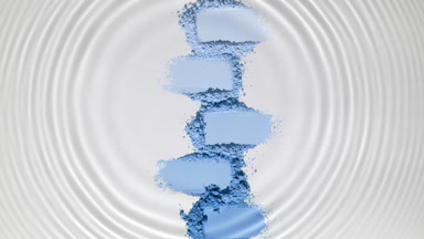 Water Droplet Circles Over Blue Powder Heaps